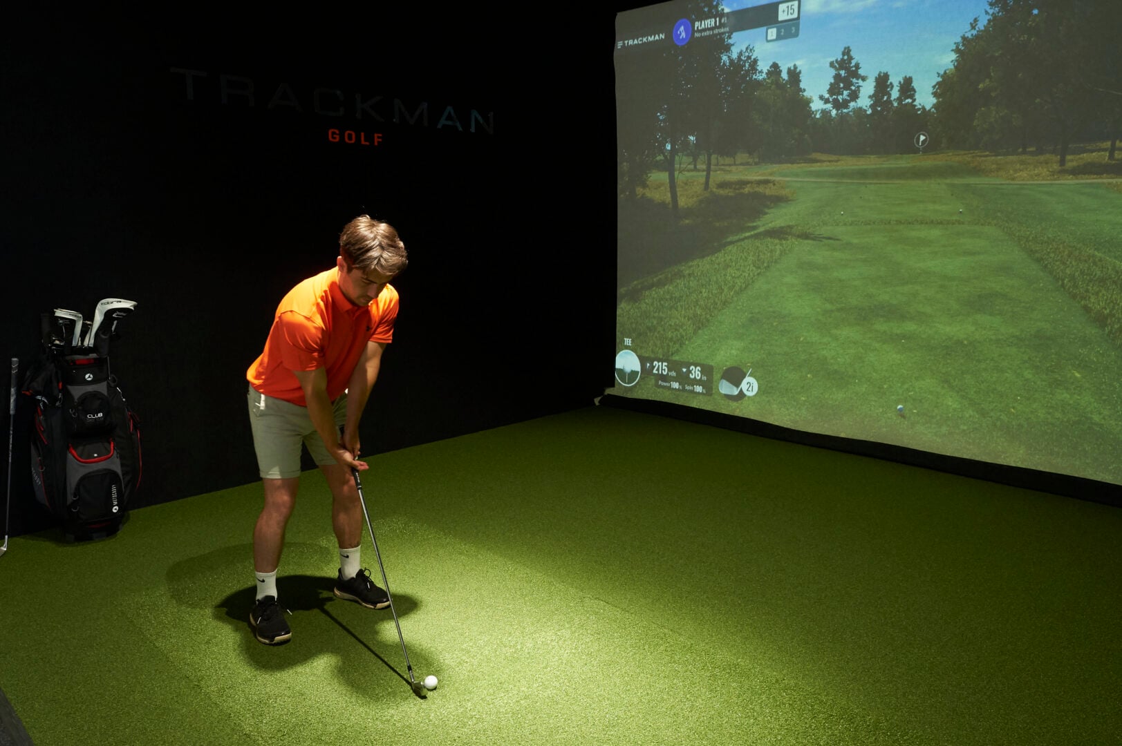 guy using trackman golf simulator at mattishall golf club