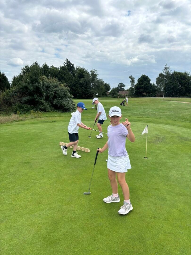 kids putting at mattishall golf club